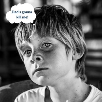 A young child looking guilty.